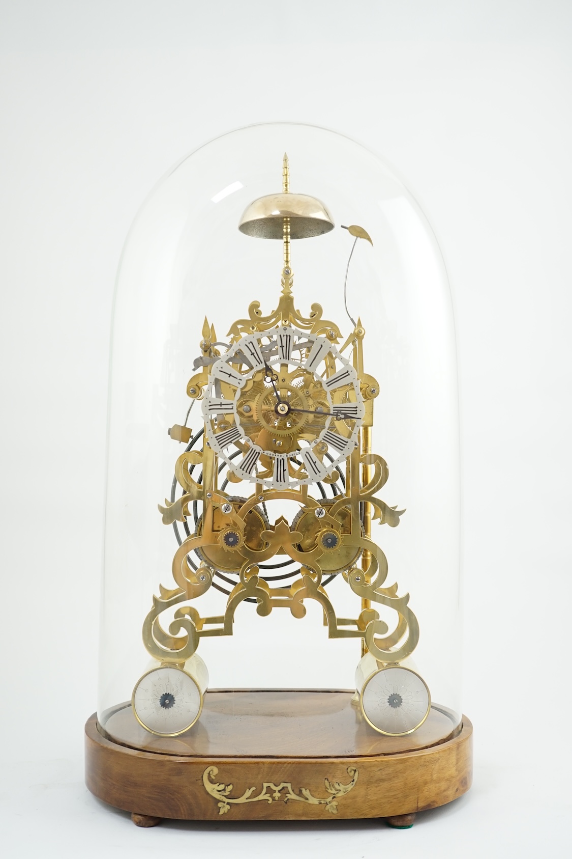 A Victorian brass skeleton clock